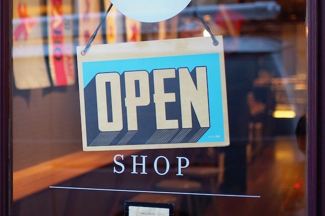 Stock photo of a business open sign.